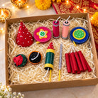 Gift box of handmade felt firecrackers: rockets, hats and sparkler sticks